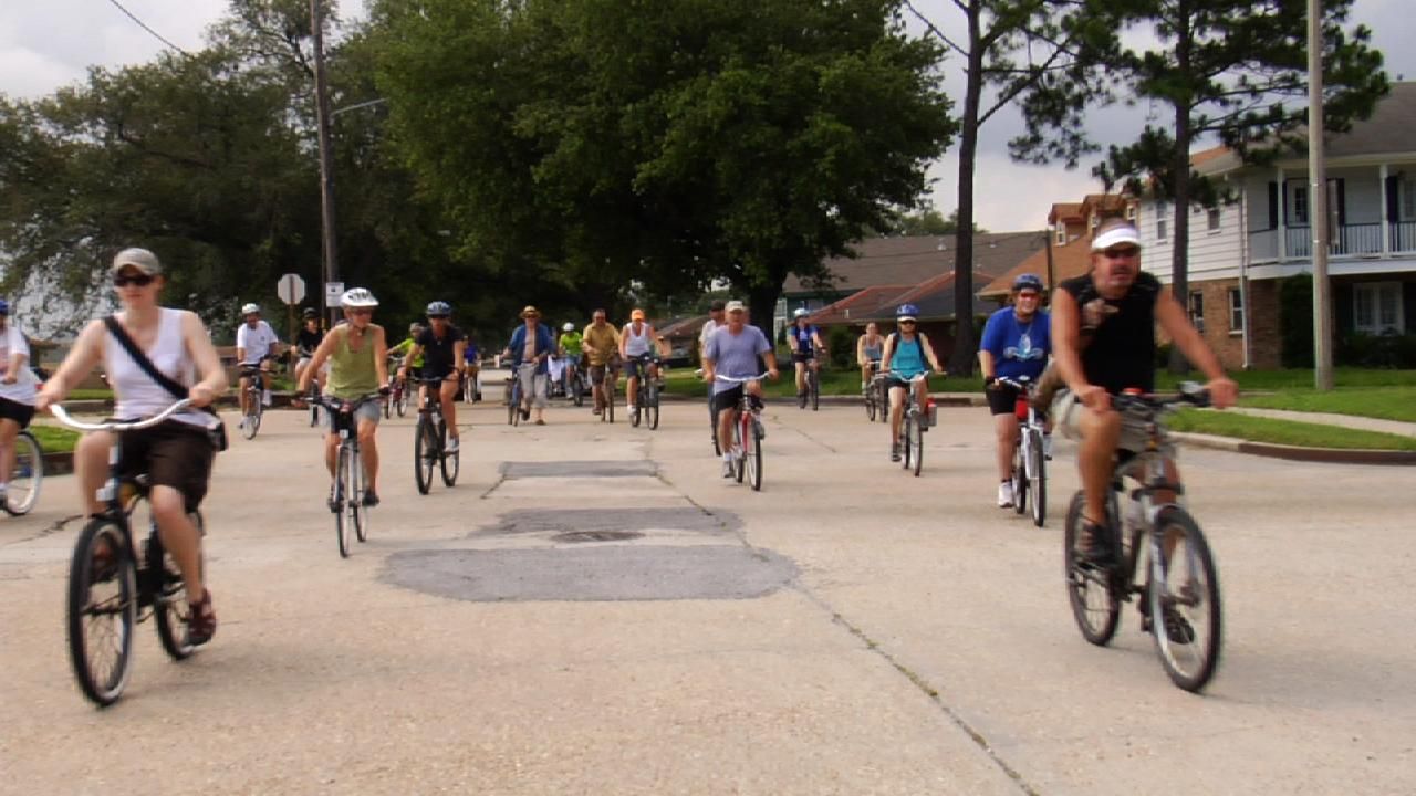 Cyclists on the levee breach bike tour