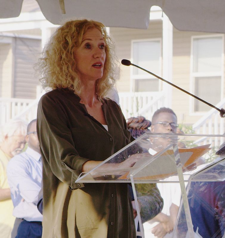Sandy Rosenthal speaking at a podium